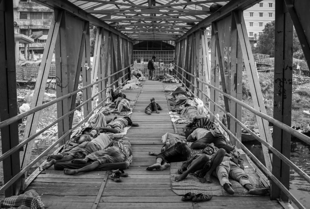 Tired Sleep on the Bridge, Amdad Hossain, 2019
