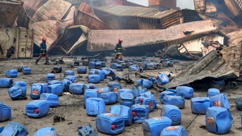Chemical Explosion, Subrata Dey | Sitakunda, Bangladesh (08/06/2022) – A chemical explosion and fire at BM container depot Sitakunda upazila of Chittagong at 4th June 2022. 49 people were confirmed dead in the blaze, and the mixing of chemicals in the air and water has a devastating effect on the environment. The explosion at the depot spilled plastic containers into the nearby river, where the chemical-laced water entered the aquifer and destroyed the fresh water supply.